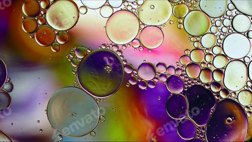 Preview: Abstract Colorful Food Oil Drops Bubbles and spheres Flowing on Water Surface