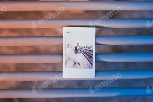Preview: polaroid young caucasian man outdoor
