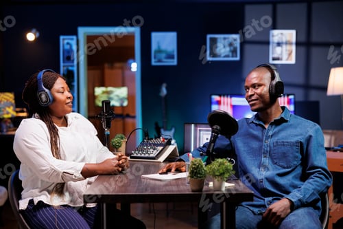 Preview: Host with microphone interviews influencer