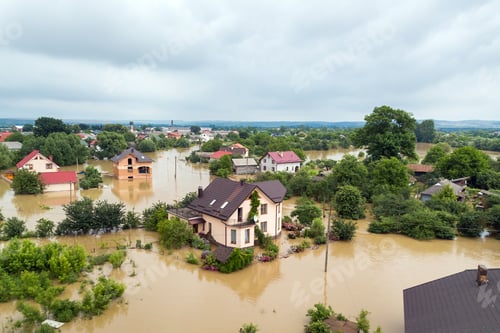 Preview: Aerial view of flooded houses with dirty water of Dnister river in Halych town, western Ukraine.