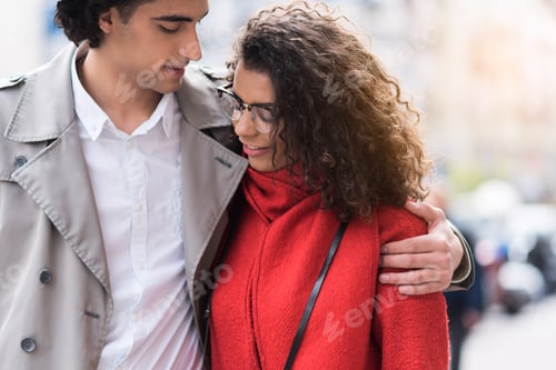 Preview: Portrait Of Happy Loving Couple Hugging During Walk In City. They Are Smiling