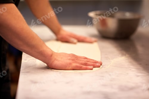 Preview: chef hands preparing dough on table at kitchen