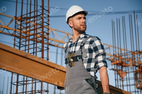 Preview: Confident worker. Man is on the construction site at daytime