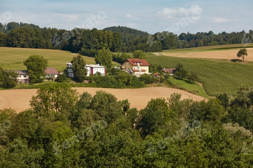 Preview: Traditional countryside cottages in austrian hills. Austria landscape