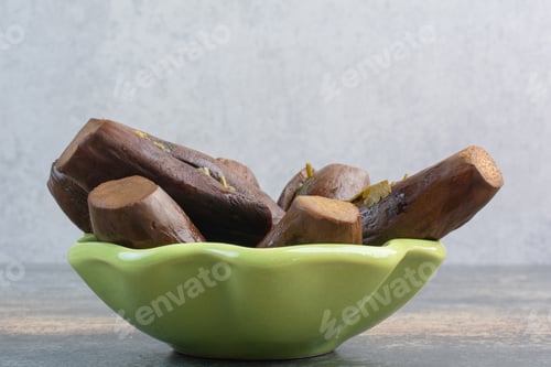 Preview: Some of salt fresh eggplants on green plate