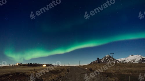 Preview: Green Aurora by the mountain on blue sky