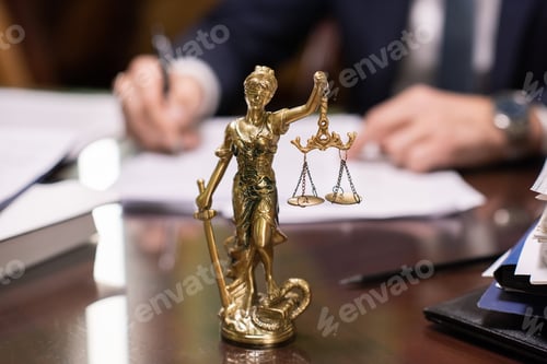 Preview: Lady Justice with her eyes bound holding scales