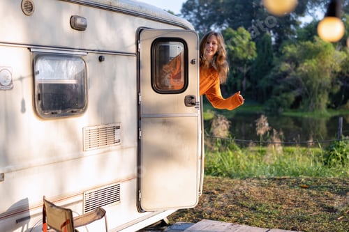 Preview: Family on holiday with motor home camper van daughter wake up open van's door greeting