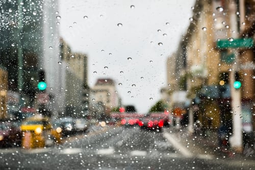 Preview: Driving through San Francisco on a rainy day; rain drops on the windshield; California