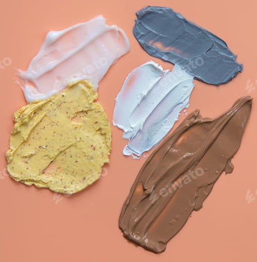 Preview: Different smears of cosmetics. Selective focus. Wet.