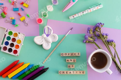 Preview: Coffee and crafting tools on a colorful background