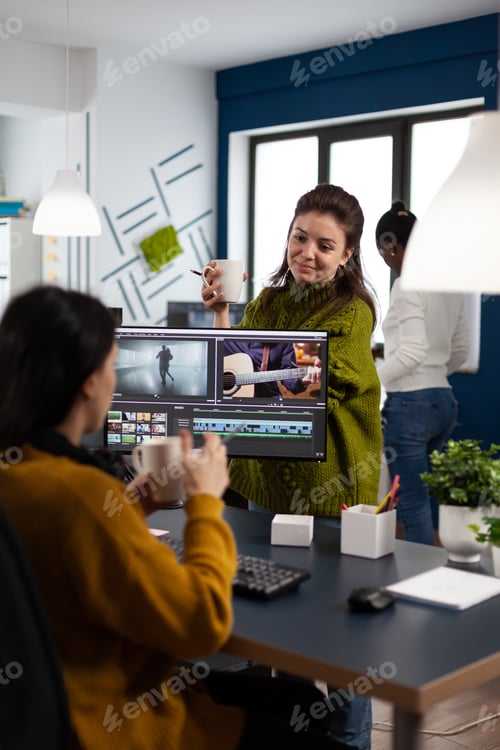 Preview: Women videographers editing video project creating multimedia content