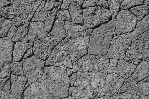 Preview: Abstract Texture Of Black Color Of A Stone Wall With Cracks For Empty And Pure Backgrounds And For