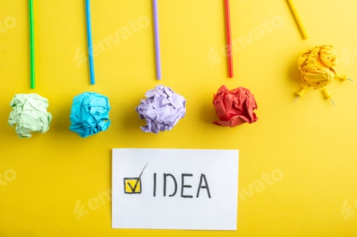 Preview: top view colorful squeezed papers with sticks on yellow background color notepad paper photo light