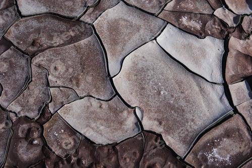 Preview: Closeup shot of a dry soil near the pond in Rio Tinto mining park