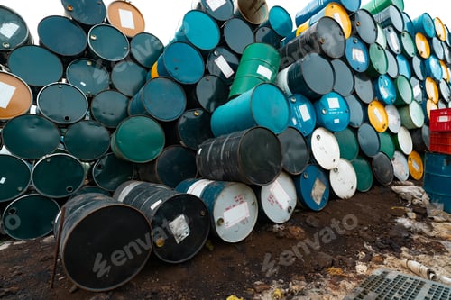 Preview: Old chemical barrels. Hazard chemical barrel with warning label. Blue, green, yellow and black oil