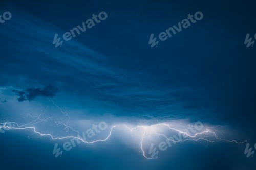 Preview: Bright Lightning On Blue Night Sky During Hunderstorm