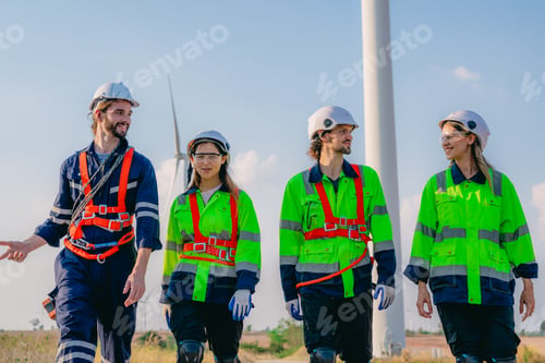 Preview: Professional engineer technician working outdoor at wind turbine field