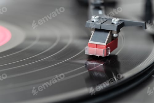 Preview: Closeup of vintage turntable while playing a record