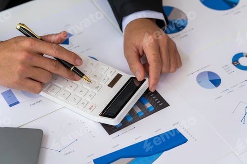 Preview: male accountant or banker making calculations. Savings money, Annual tax calculation finances, and e