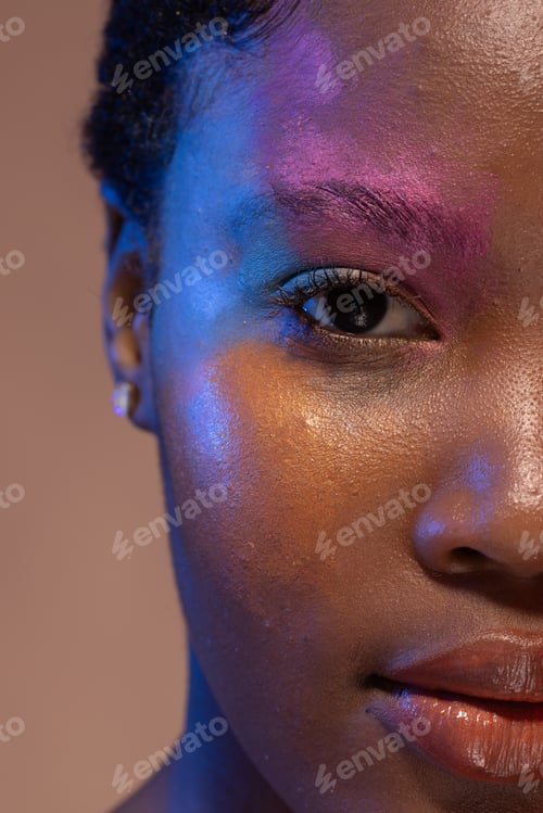 Preview: Half portrait of african american woman with short hair and colourful make up