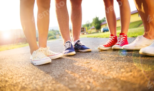 Preview: Sneakers of teenage boys and girls