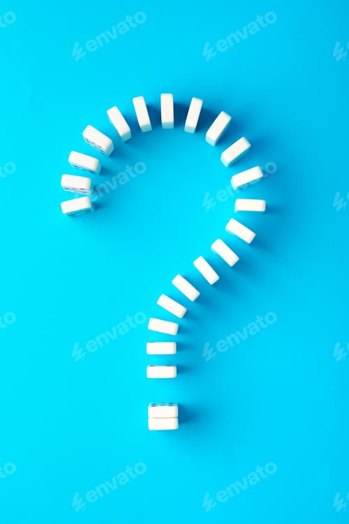 Preview: Domino tiles set in question sign shape on blue background