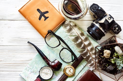 Preview: Map, passport, money, compass, and glasses, photo camera, pipe