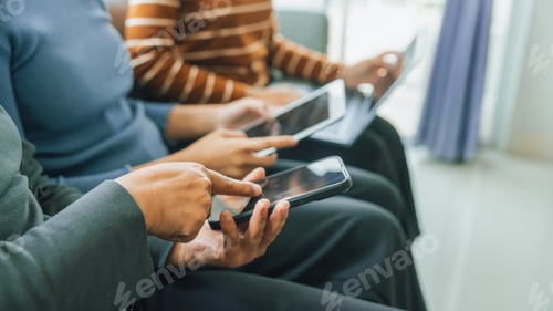 Preview: My device of three people as mother, daughter and friends watching social media news, using laptop