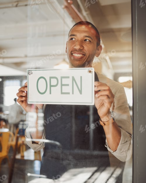 Preview: Small business owner advertising that his store is open. Bistro boss waiting for customers in his s