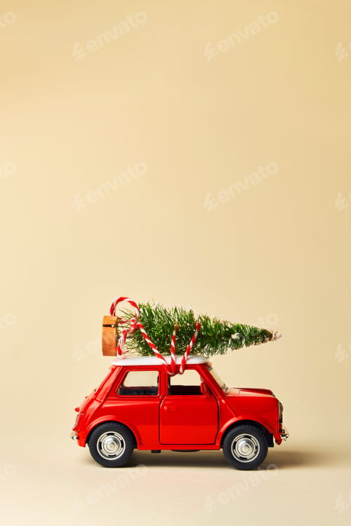 Preview: Little red toy car and Christmas tree