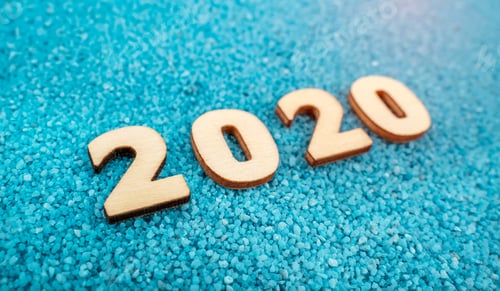 Preview: Happy New Year 2020 Concept, Wood Block 2020 On Blue Sand Background