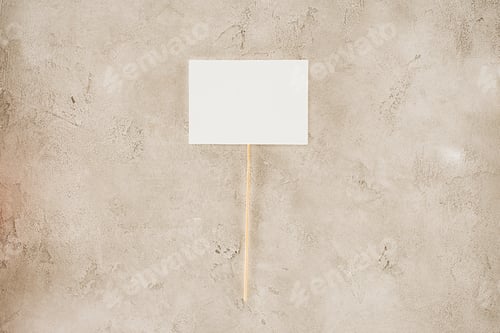 Preview: top view of blank placard on concrete surface