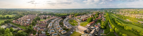 Preview: Aerial drone view of the Cane Hill area in Coulsdon, UK, with new houses and apartments.