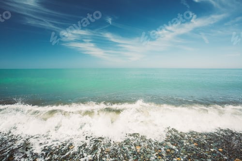 Preview: Sea Ocean Waves Washing Pebble Stones Beach At Sunny Summer Day