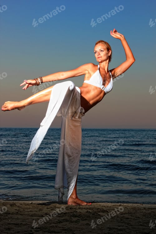 Preview: woman relaxing on the beach