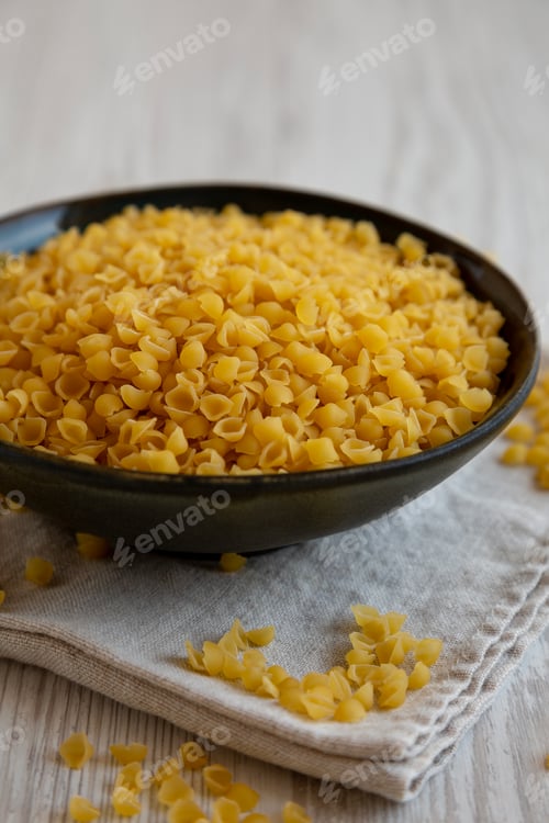 Preview: Homemade Perlini Pasta in a Bowl, side view. Close-up.