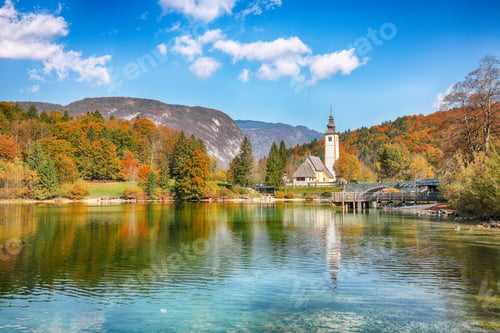 Preview: Gorgeous view of Church of St. John the Baptist on Bohinj Lake .