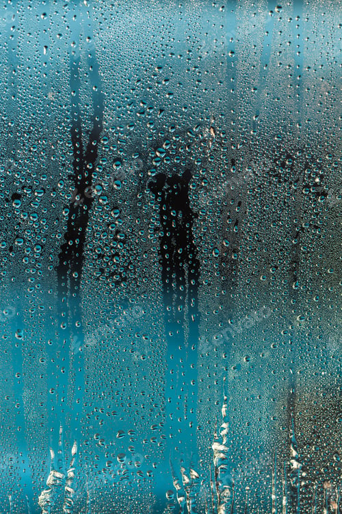 Preview: rain drops on window blue abstract background