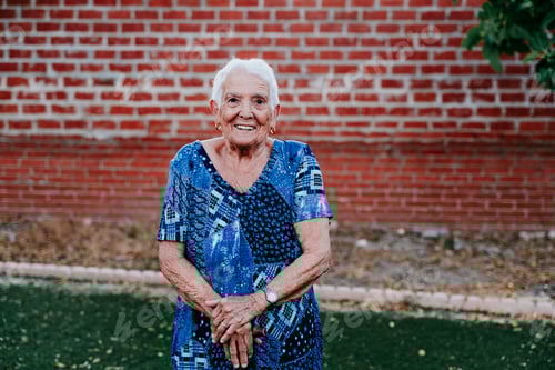 Preview: portrait of old lady in her 80s smiling happily