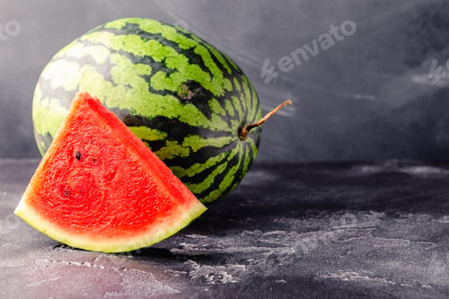 Preview: Fresh tasty delicious watermelon on a dark background