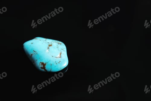 Preview: Beautiful turquoise gemstone on black background. Space for text