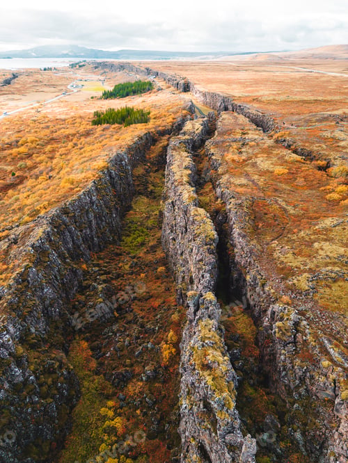 Preview: Autumn red folliage covering the landscape in Thingvellir National Park