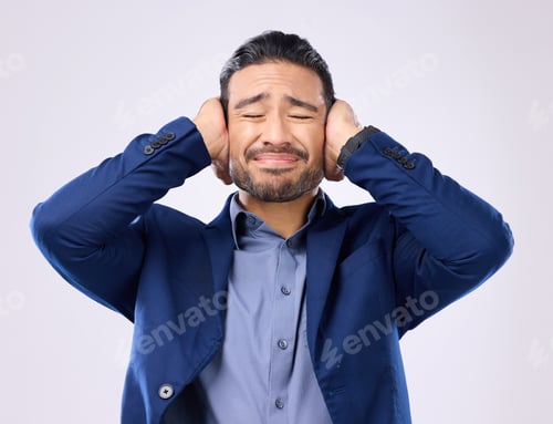 Preview: Employee, noise and Asian man cover ears, stress and mental health against a grey studio background