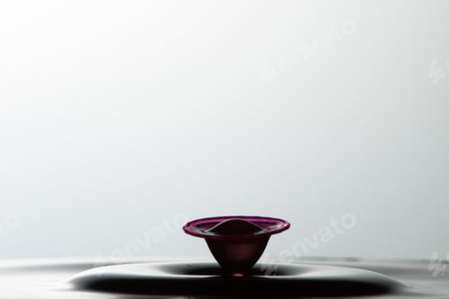Preview: Splash of pink liquid with high speed flash