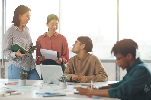 Preview: Team of designers working at office