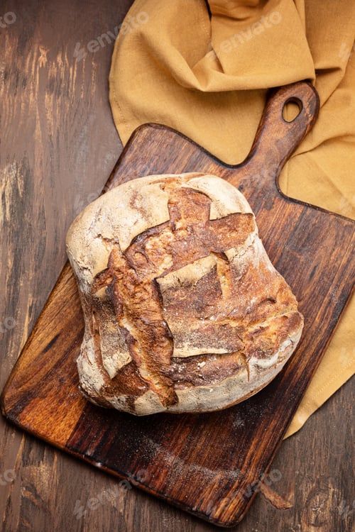 Preview: Fresh organic home made bread. Healthy eating, buy local, bread recipes concept. Top view