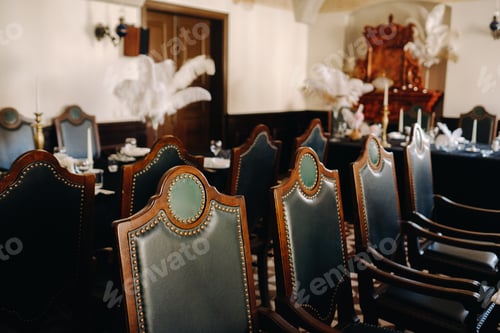 Preview: Antique chairs for a wedding evening in the restaurant of an old castle
