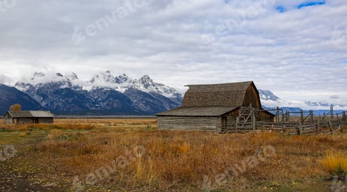 Preview: Aged barn in a wide field in Grand Tetons National Park