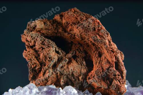 Preview: Closeup of volcanic lava with white minerals on black background